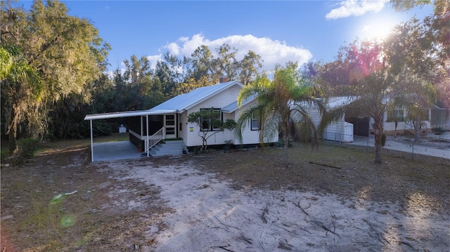 view of front facade with a carport