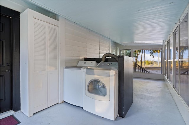 washroom with washer and clothes dryer