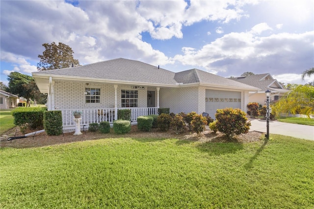 ranch-style house with concrete driveway, an attached garage, covered porch, a front lawn, and brick siding