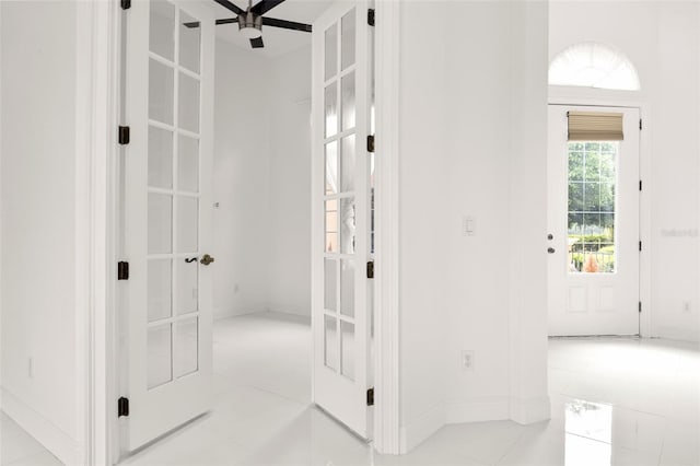 hallway with light tile patterned floors