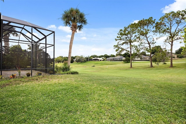 view of yard featuring a lanai