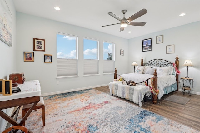 bedroom featuring ceiling fan and wood-type flooring