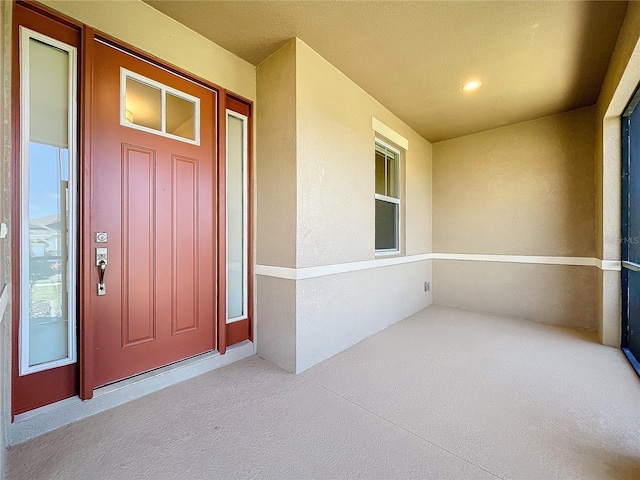 entrance to property with a porch