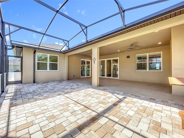 exterior space featuring a wealth of natural light and ceiling fan