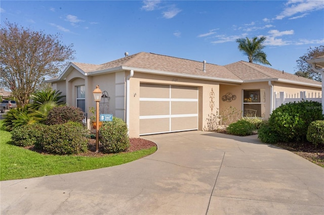 ranch-style house featuring a garage