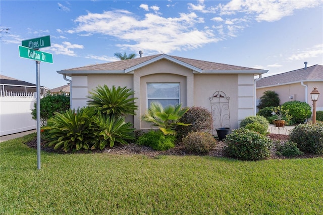 view of front of home with a front yard