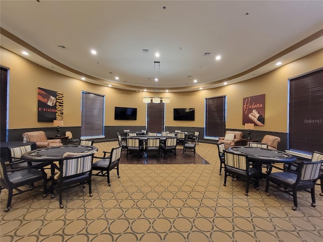 dining room featuring light carpet