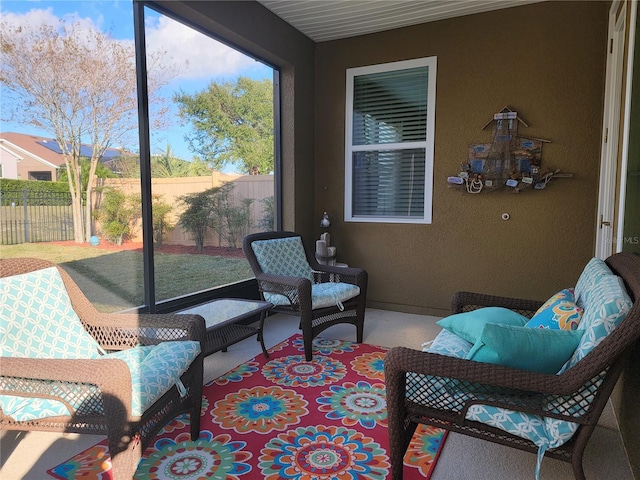 sunroom with plenty of natural light