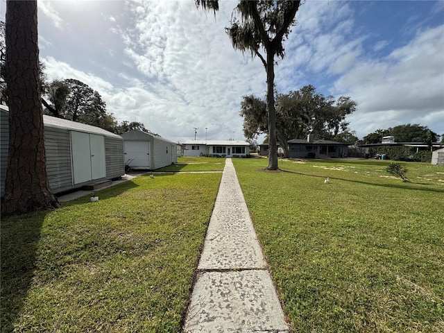 view of yard with a storage unit