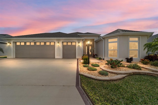 prairie-style home with a garage