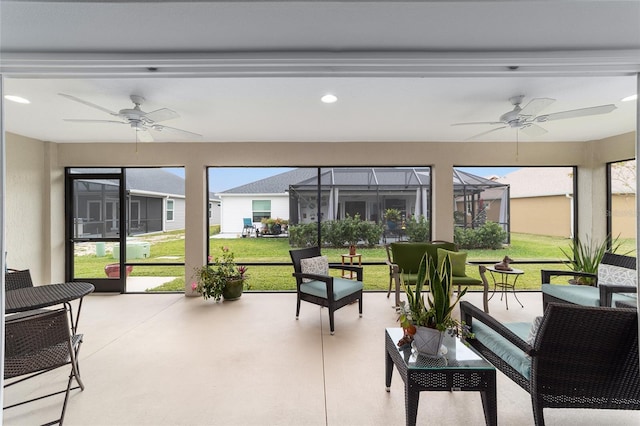 sunroom / solarium with ceiling fan