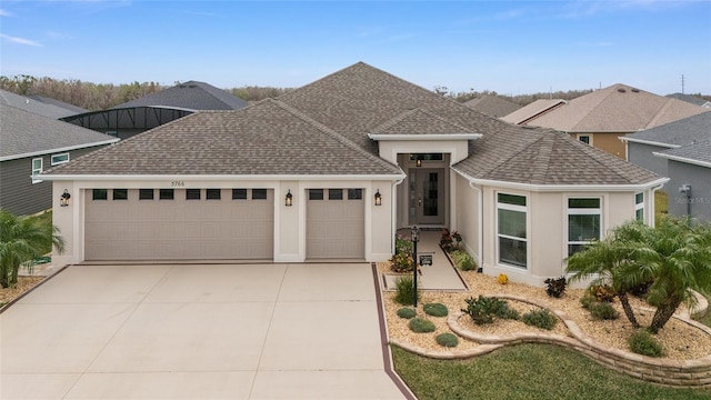 view of front of home with a garage