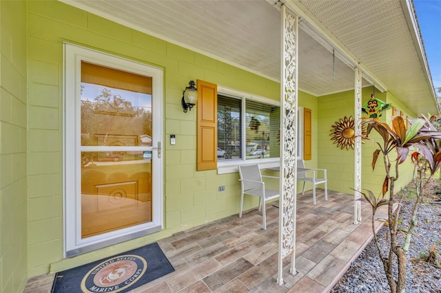 entrance to property with covered porch