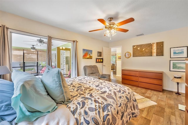 bedroom featuring ceiling fan, light hardwood / wood-style floors, and access to exterior