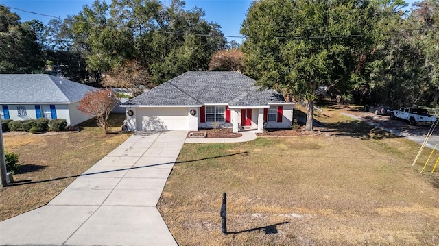 ranch-style home featuring a garage and a front yard