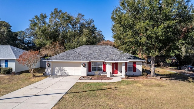 single story home with a garage and a front lawn