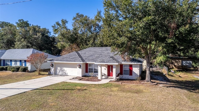 ranch-style home featuring a garage and a front lawn