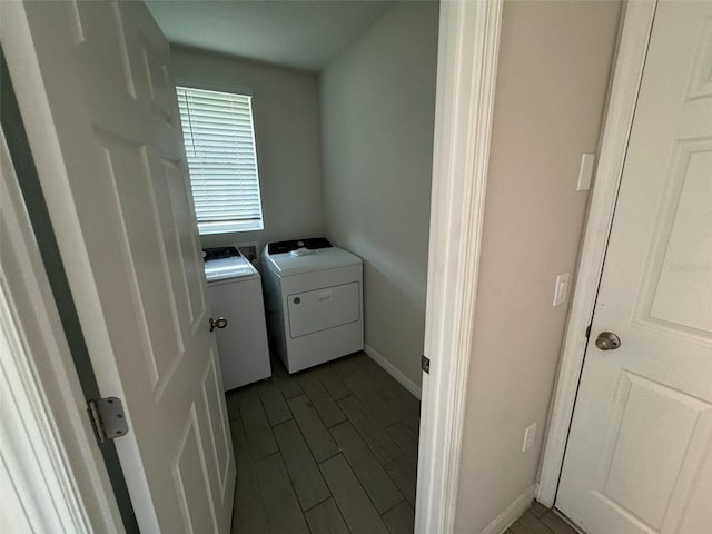 laundry room with independent washer and dryer