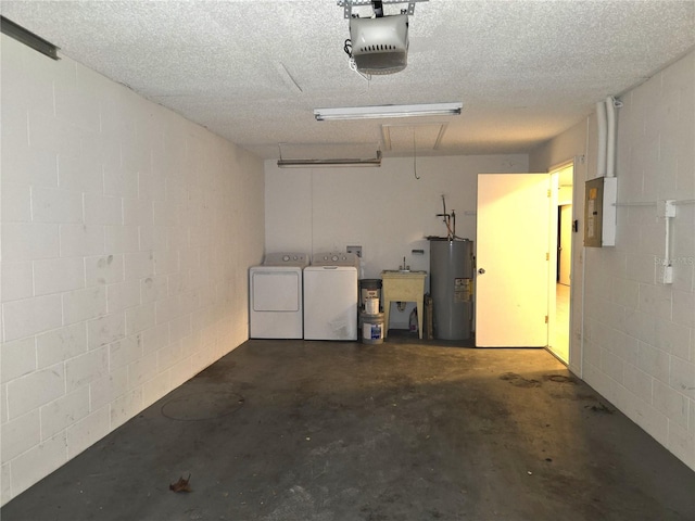 garage with electric water heater, electric panel, a garage door opener, sink, and independent washer and dryer