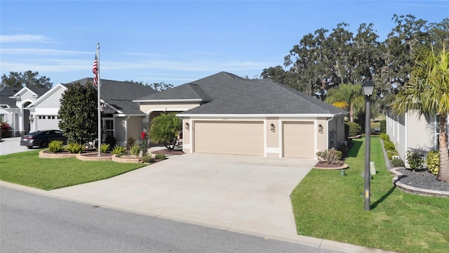 view of front of home featuring a garage and a front lawn