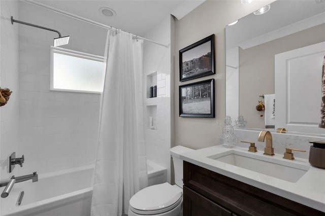 full bathroom with shower / tub combo with curtain, vanity, and toilet