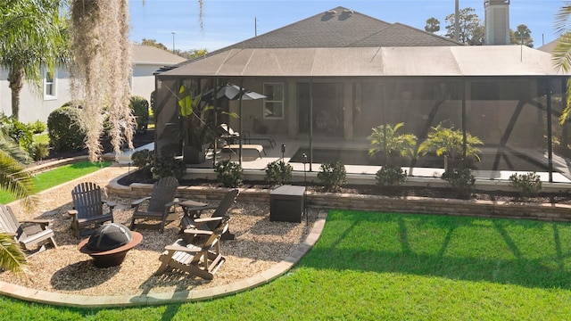 view of yard with an outdoor fire pit and a patio area