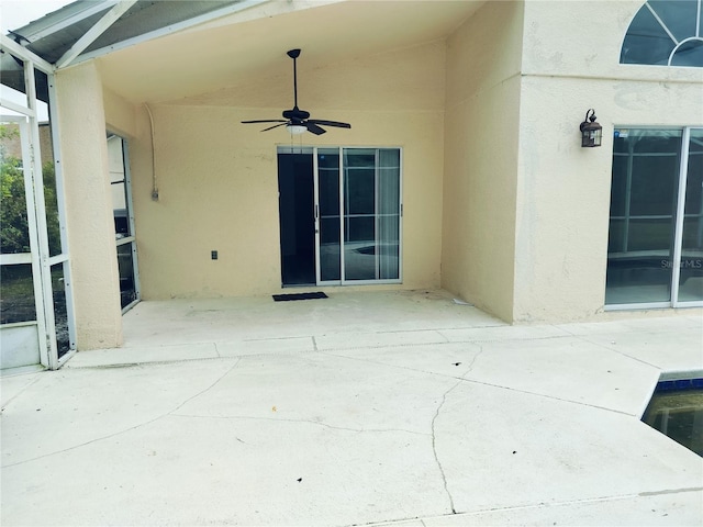 view of patio / terrace featuring ceiling fan