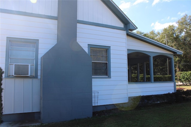 view of home's exterior featuring a sunroom