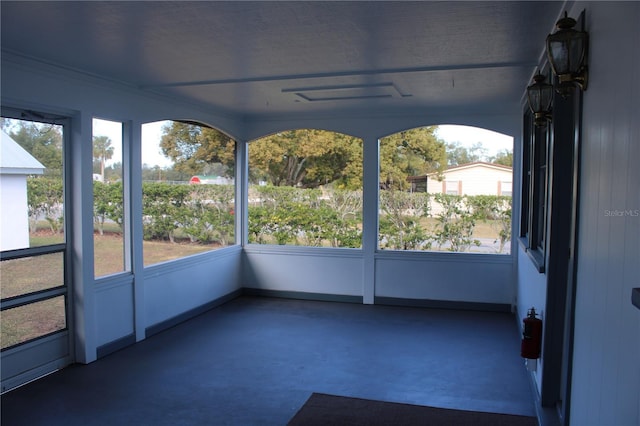 unfurnished sunroom with a healthy amount of sunlight