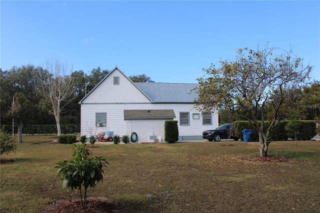 view of home's exterior featuring a yard