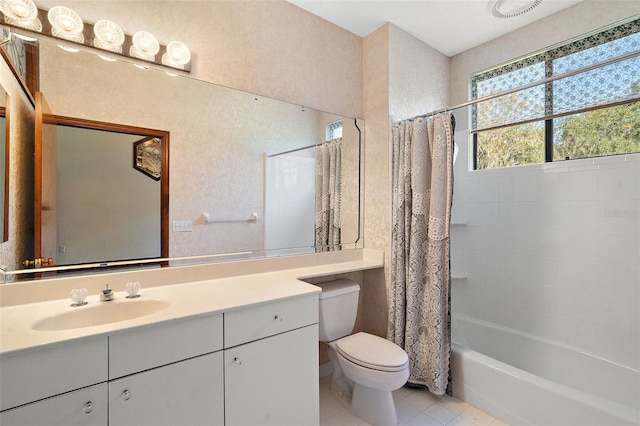 full bathroom with toilet, shower / bath combo, vanity, and tile patterned floors