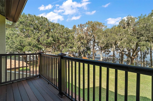 wooden deck with a yard