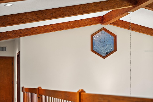 interior details featuring beamed ceiling