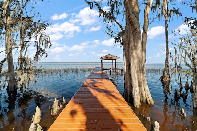 view of dock with a water view