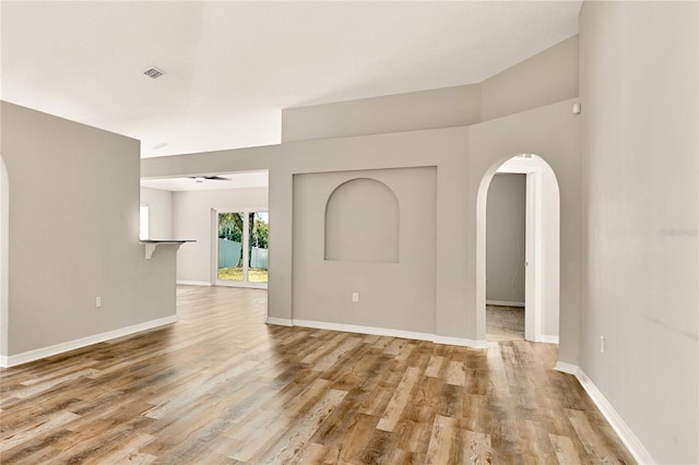 empty room with light hardwood / wood-style floors