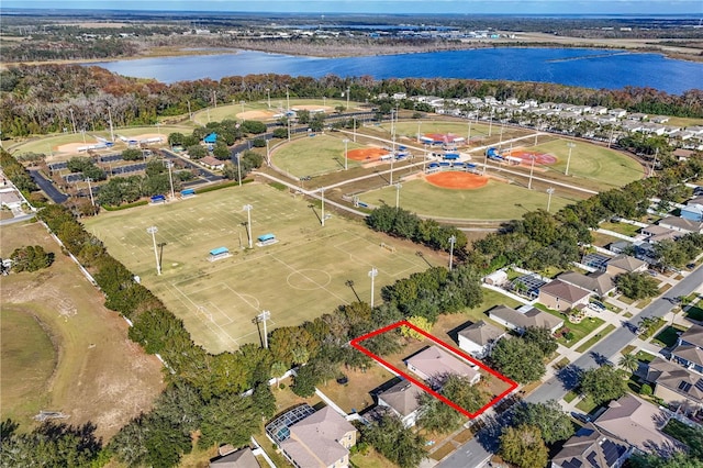 birds eye view of property featuring a water view