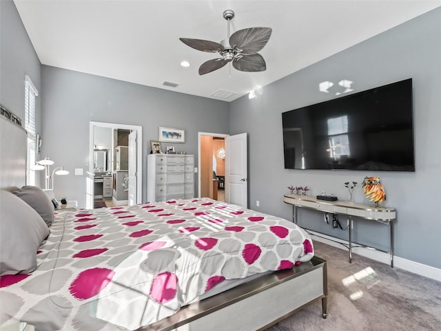 bedroom featuring carpet flooring, connected bathroom, and ceiling fan