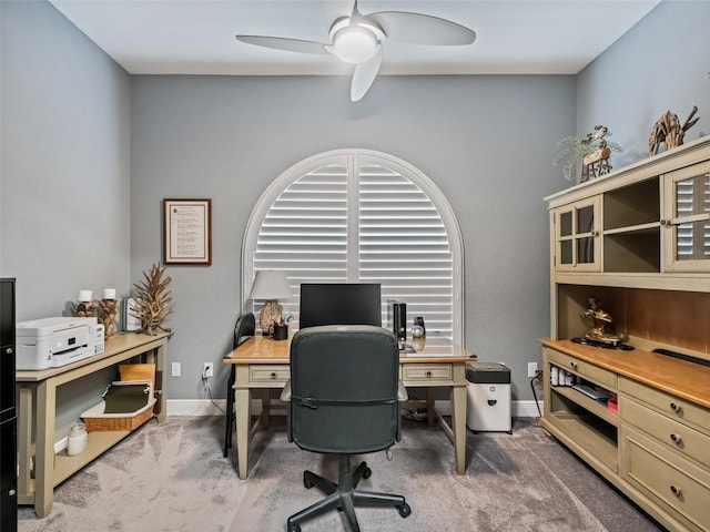 office area featuring carpet floors and ceiling fan