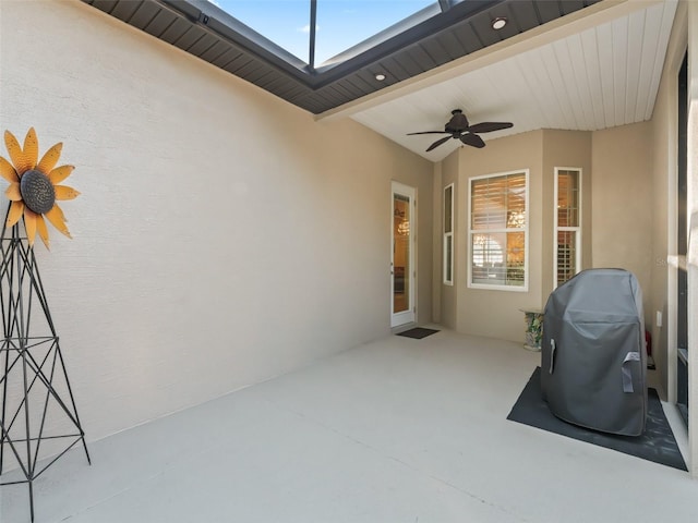 view of patio / terrace featuring ceiling fan