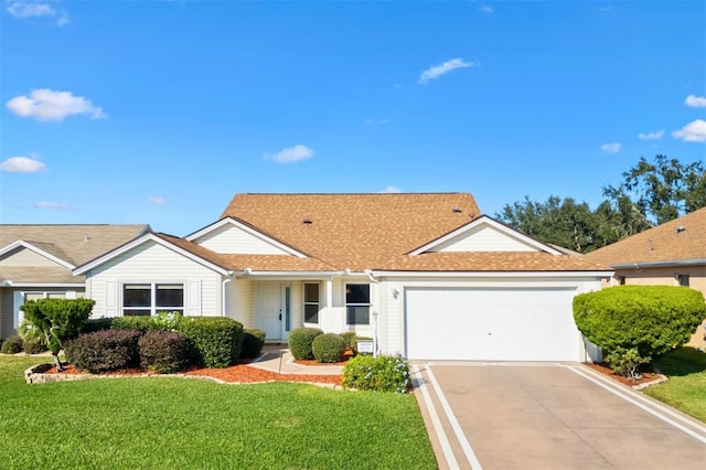 ranch-style house with a front lawn and a garage