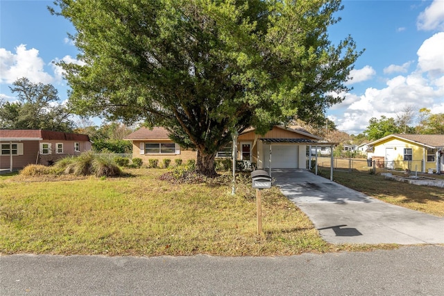 view of front facade with a garage and a front lawn