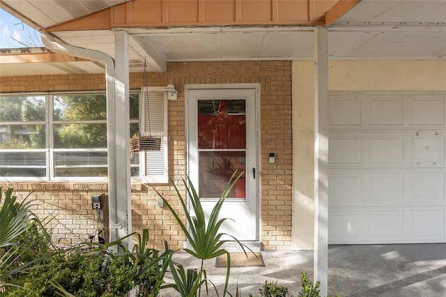 property entrance featuring a garage