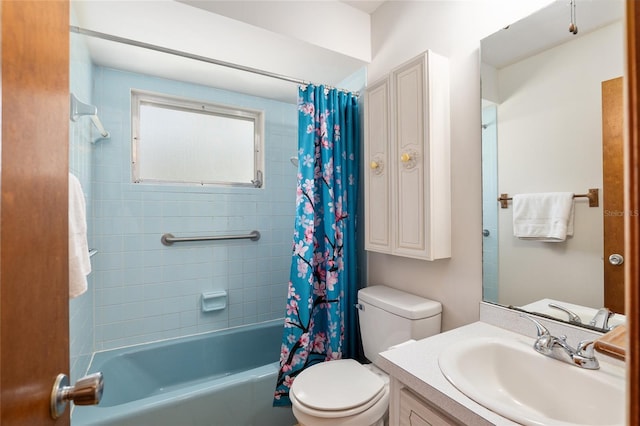 full bathroom featuring vanity, toilet, and shower / bathtub combination with curtain