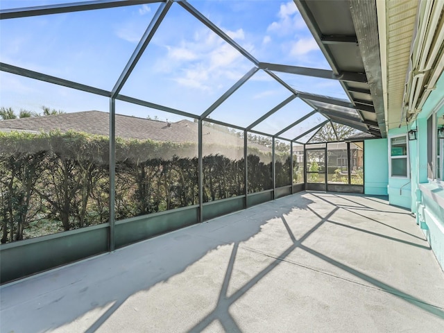 view of patio / terrace featuring glass enclosure