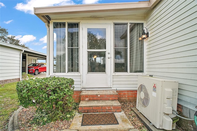 entrance to property featuring ac unit