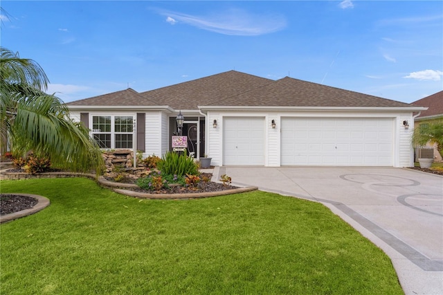 ranch-style house featuring a front yard and a garage