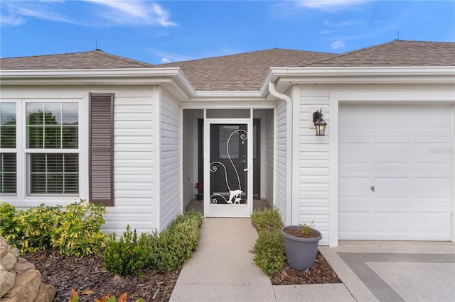 property entrance with a garage