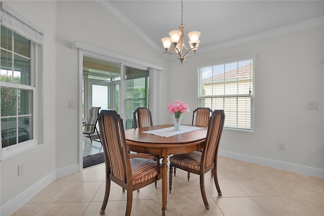 tiled dining room with crown molding, a chandelier, and vaulted ceiling