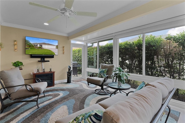 sunroom / solarium with ceiling fan