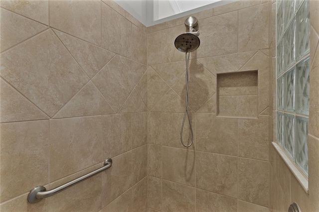 room details with a tile shower